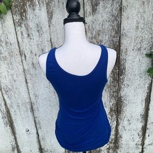 Blue tank size small good a lone or layered